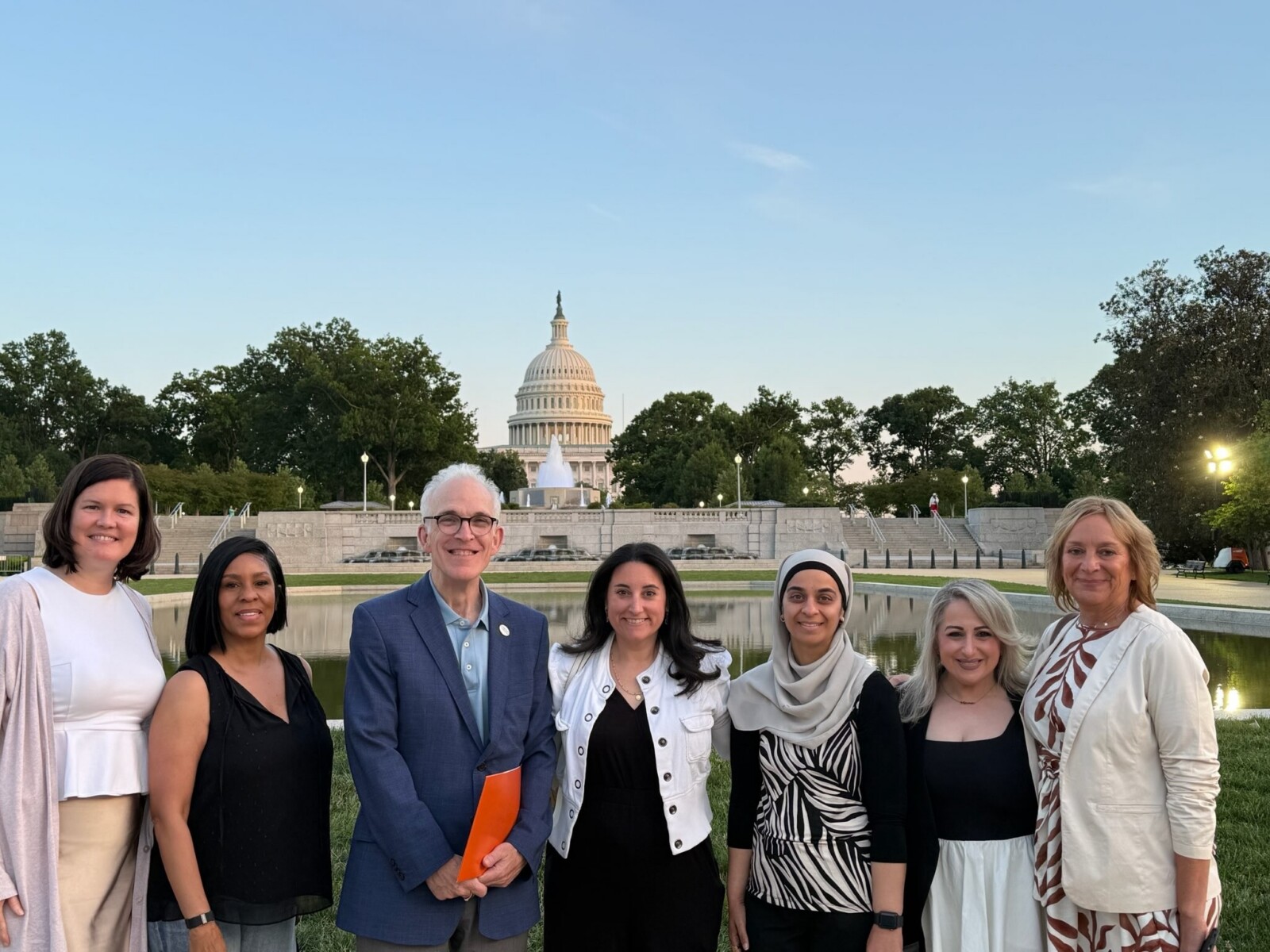 MHA CEO, along with advocates from Care Plus, Integrity House, and Bright Harbor Healthcare, standing in front of the Capitol building in Washington DC